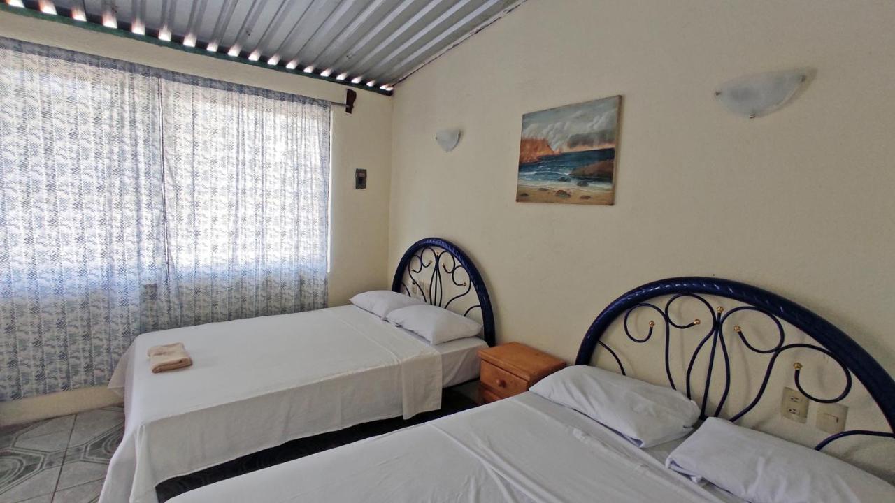 Hôtel Casa Loto Real à Santa Cruz Huatulco Extérieur photo